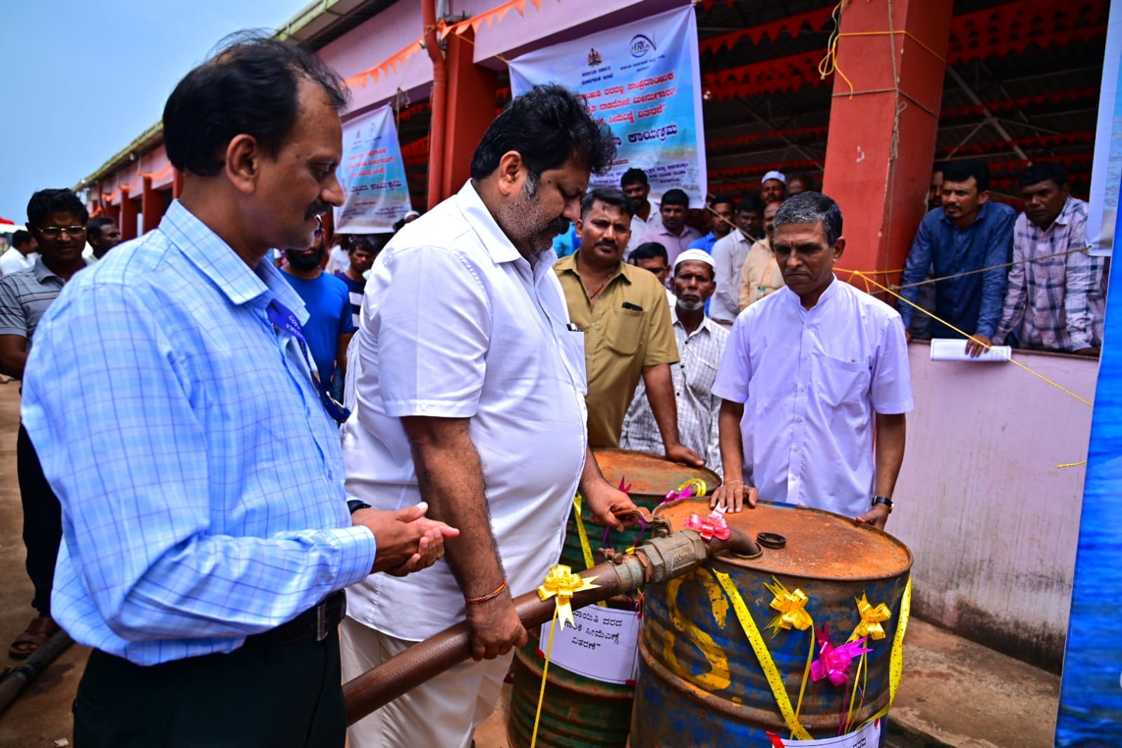 Minister Mankal launches distribution of kerosene to traditional motorized fishing boat owners