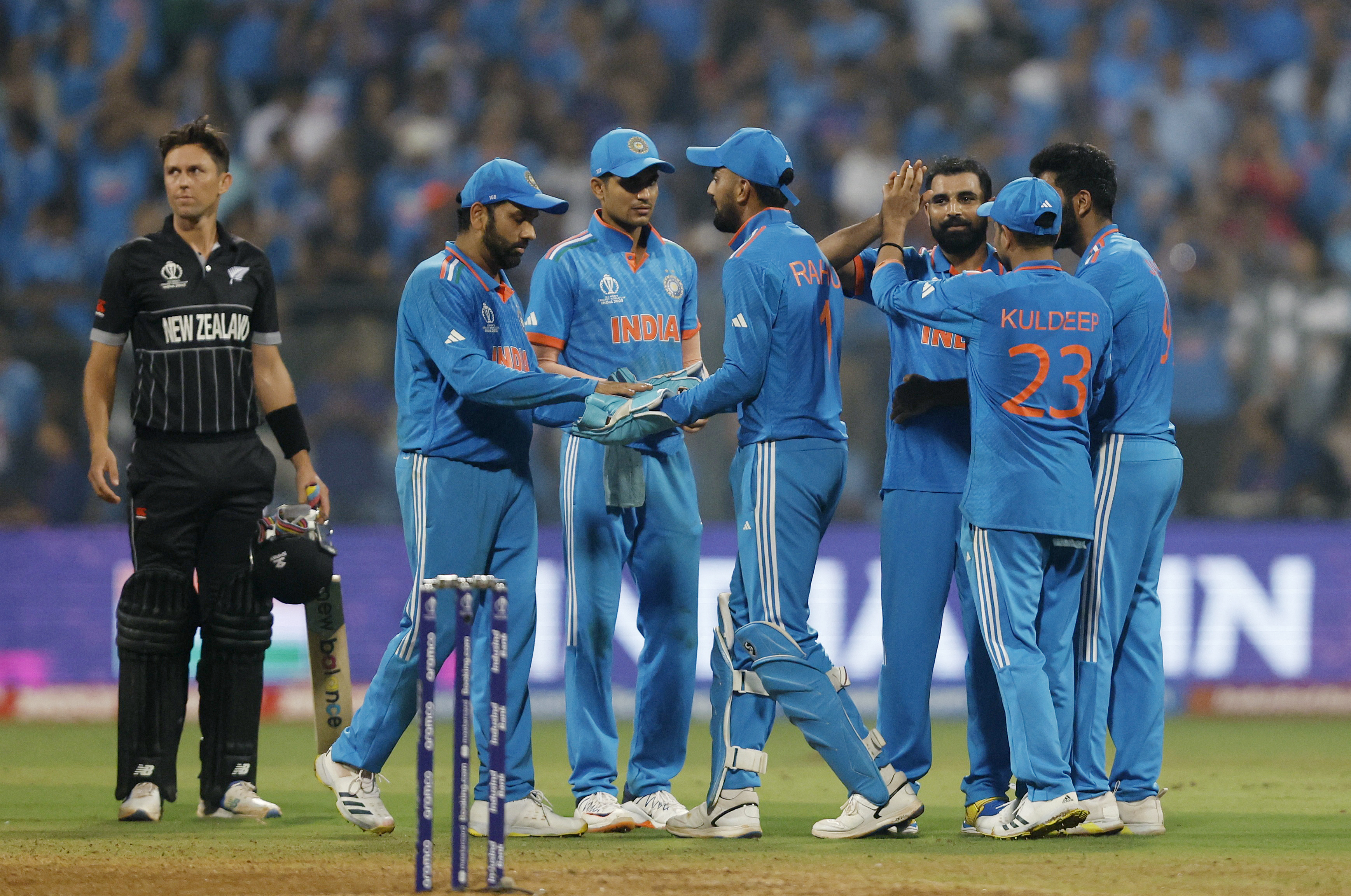 India bulldoze into WC finals, Kohli and Shami record historic performances