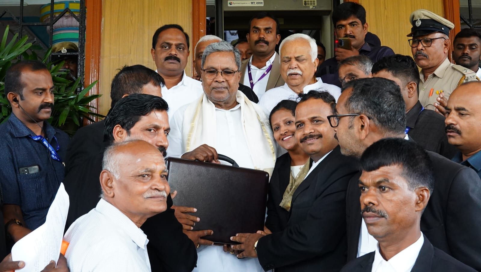 Presenting a record 14th budget, Karnataka CM Siddaramaiah says Rs 52,000 crore to be spent for five key poll promises